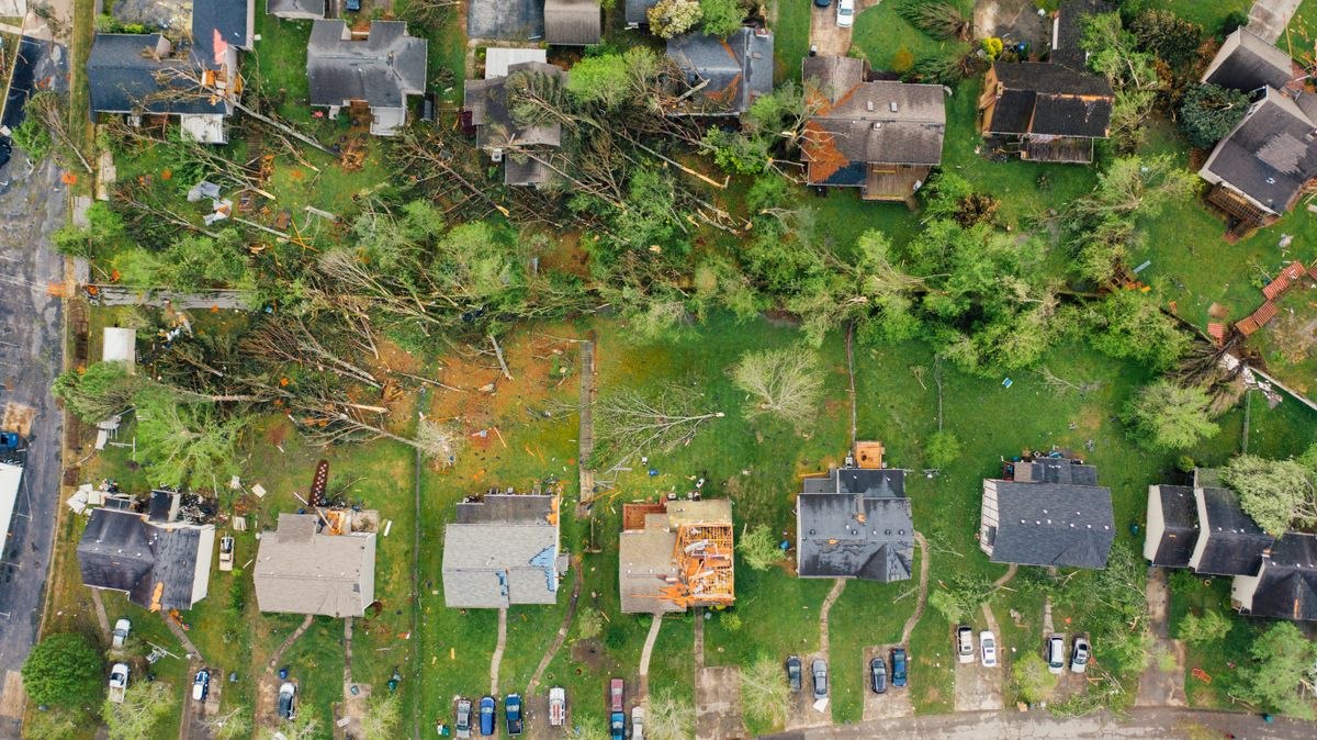 Aerial view of storm damage in a neighborhood